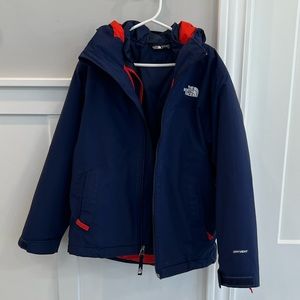 Boys 3 in 1 winter jacket by The North Face.  Size (7/8)